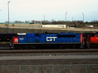 The GT heritage unit is leading CN 527 as it heads back to Southwark Yard to bring a unit to CN 321. CN 401 heads west in the background.