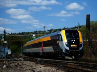 Now running between Ottawa and Quebec City on a more regular basis, a Siemens trainset is on VIA 24 as it heads east, with Mount Royal in the background.