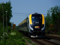 Passing speed limit signs that have been passed by numerous decades worth of VIA trains, VIA 24 with a Siemens consist heads towards its next stop at Dorval Station.