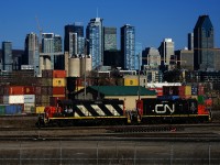 CN 4115 & CN 7020 are returning light power from dropping off grain cars at a nearby client.