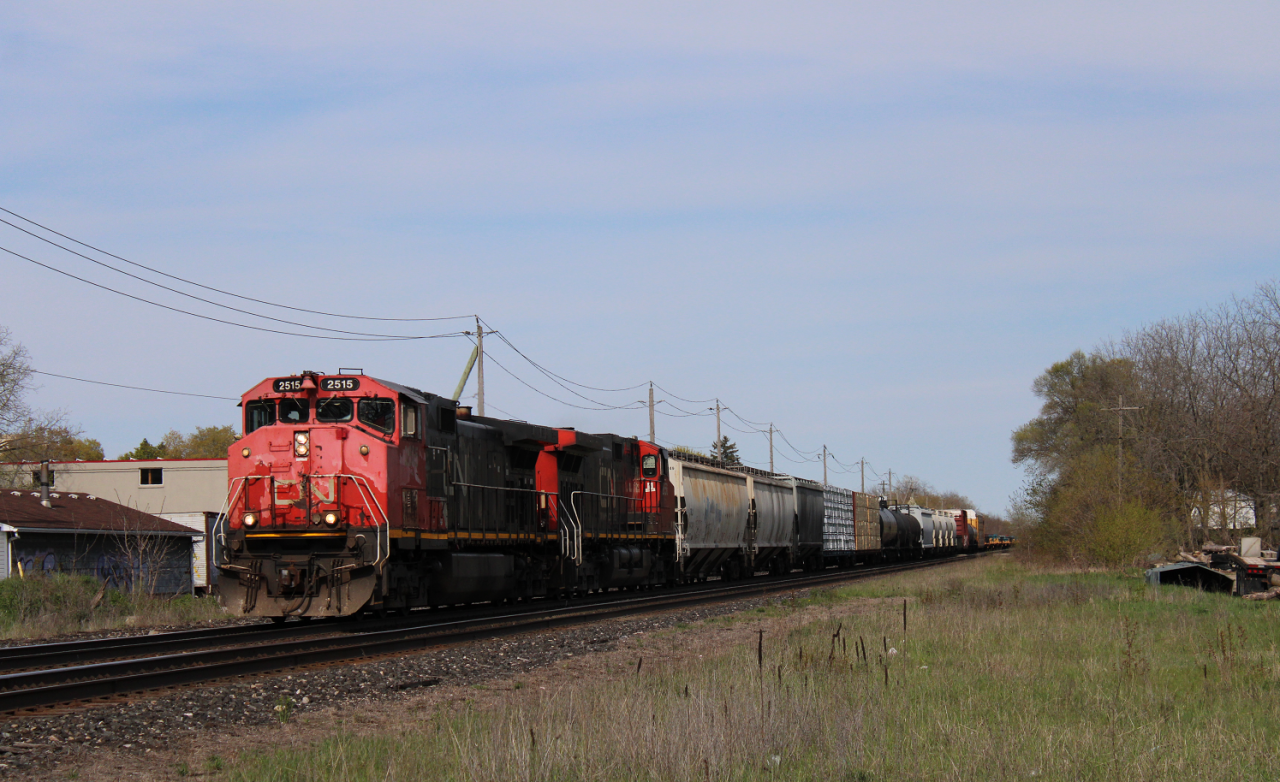 CN A435 passes by Woodstock with a nice Canadian cab leader