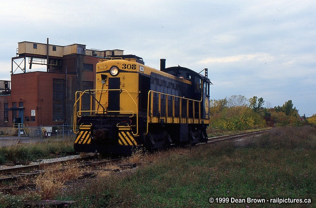 PCHR 308 returning back to Merritton after switching the Domtar plant, the Domtar Steam plant in the background is gone. All new homes are being built.