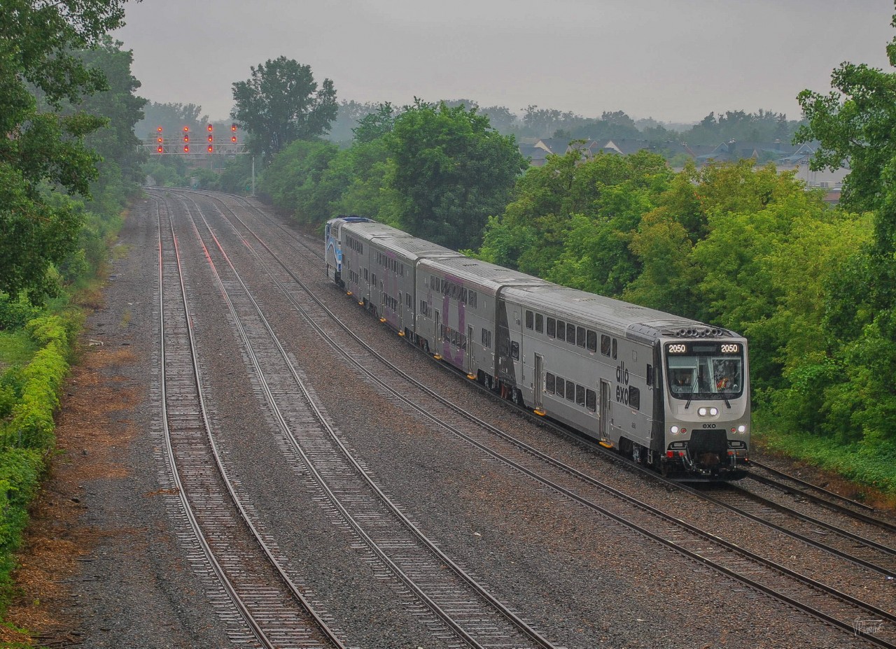 On June 29, 2023, the EXO test-train of CRRC cars (EXO S170) enters the CPKC Park Subdivision to test on the St-Jérome line.