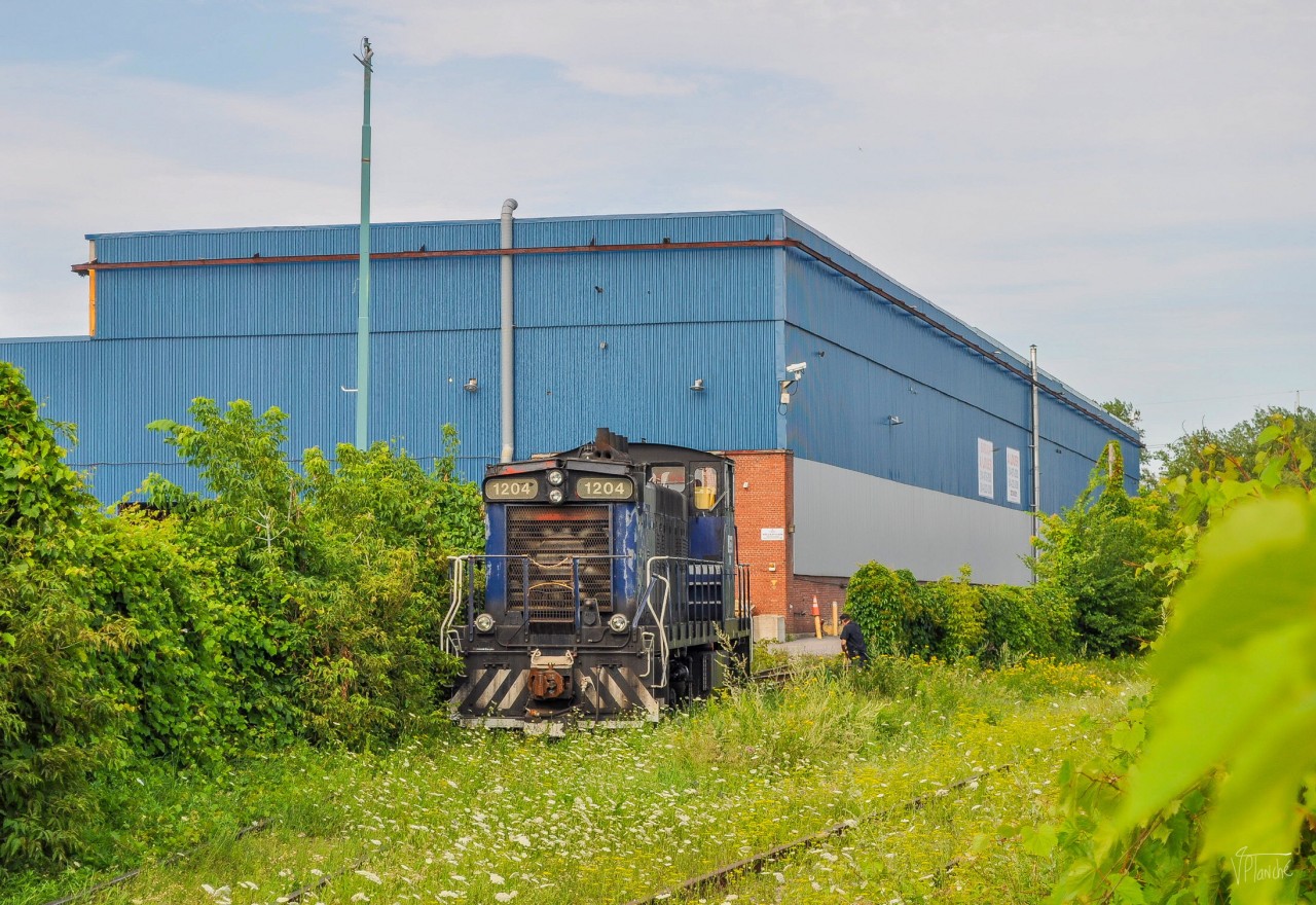 On July 20, 2023, the old ex-CN GMD-1 ended its life for CAD Railway Industries. She is seen here changing lanes west of the CAD course after maneuvering a train of tank cars.