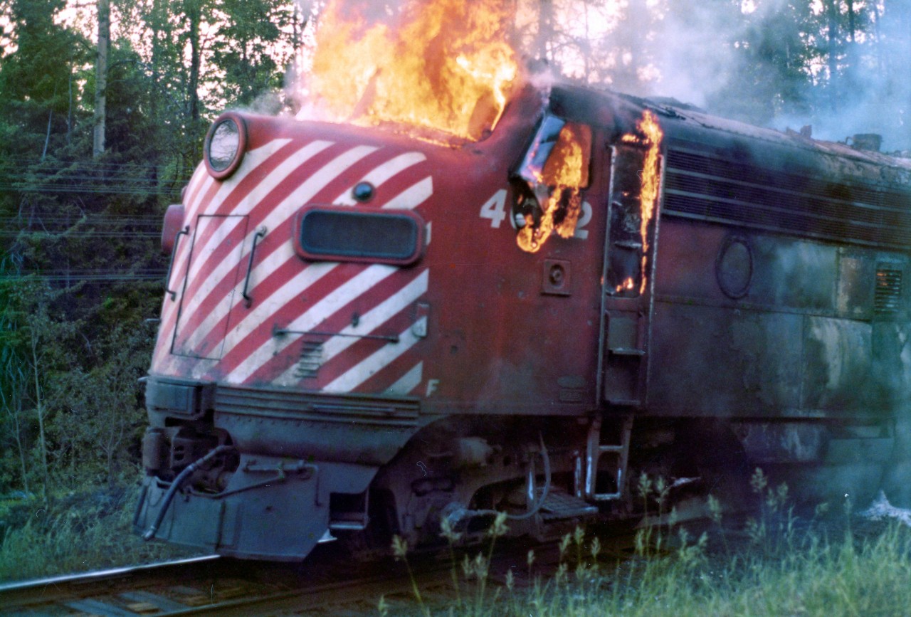 On July 5, 1975 Canadian Pacific FP7 locomotive No. 4062, the third locomotive of westbound Extra 4088 caught fire and was disconnected from the train near mileage 78.5, about two miles east of Franz, Ontario. A Ministry of Natural Resources forest fire suppression crew (including the photographer) was dispatched from Wawa to the scene to prevent the fire from spreading to the adjacent forest.