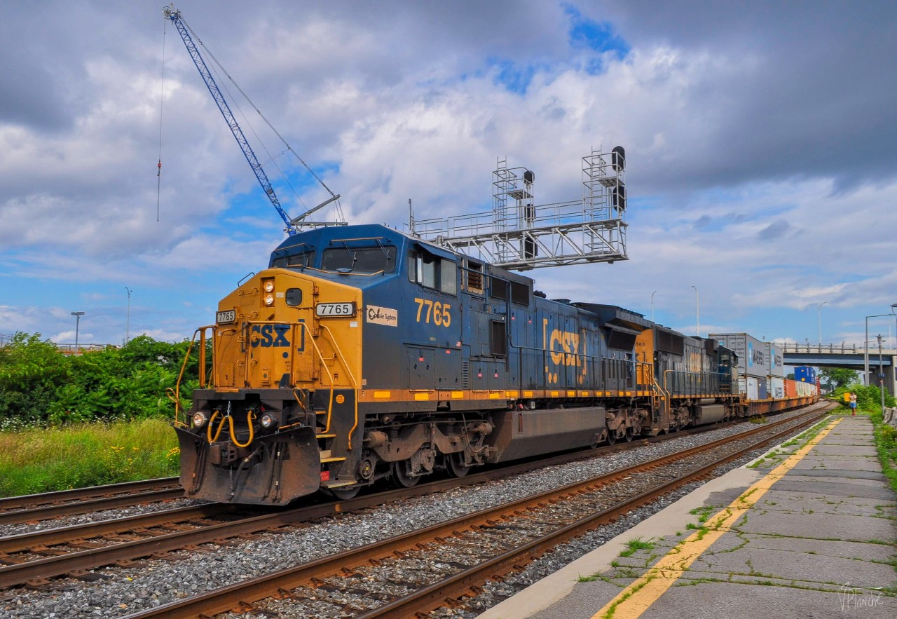 On August 11, 2023, CN 327 was made up of two beautiful locomotives: the 7765 with the Chessie System sticker and an SD70MAC.