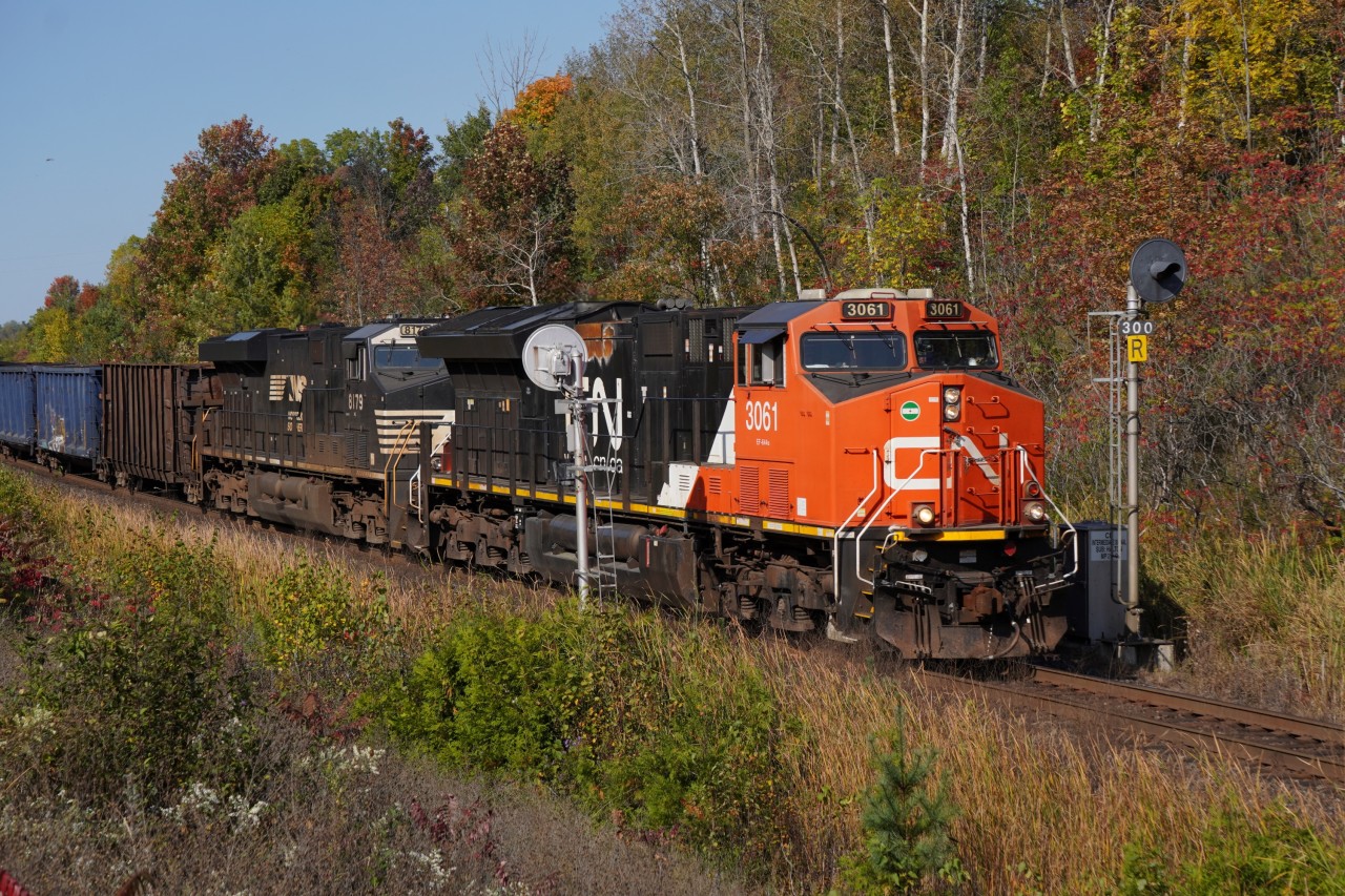 Making track speed, CN 3061 leads M397 as it heads timetable West down through MP 30 on the Halton with NS 8179 trailing behind, which came off of M396 earlier that morning.