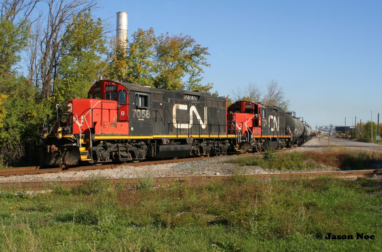 CN’s 07:00 Job is pictured with GP9RM’s 7058 and 7068 having just worked Parkland Fuels on the former Stelco Rod Mill trackage in Hamilton, Ontario’s north end.