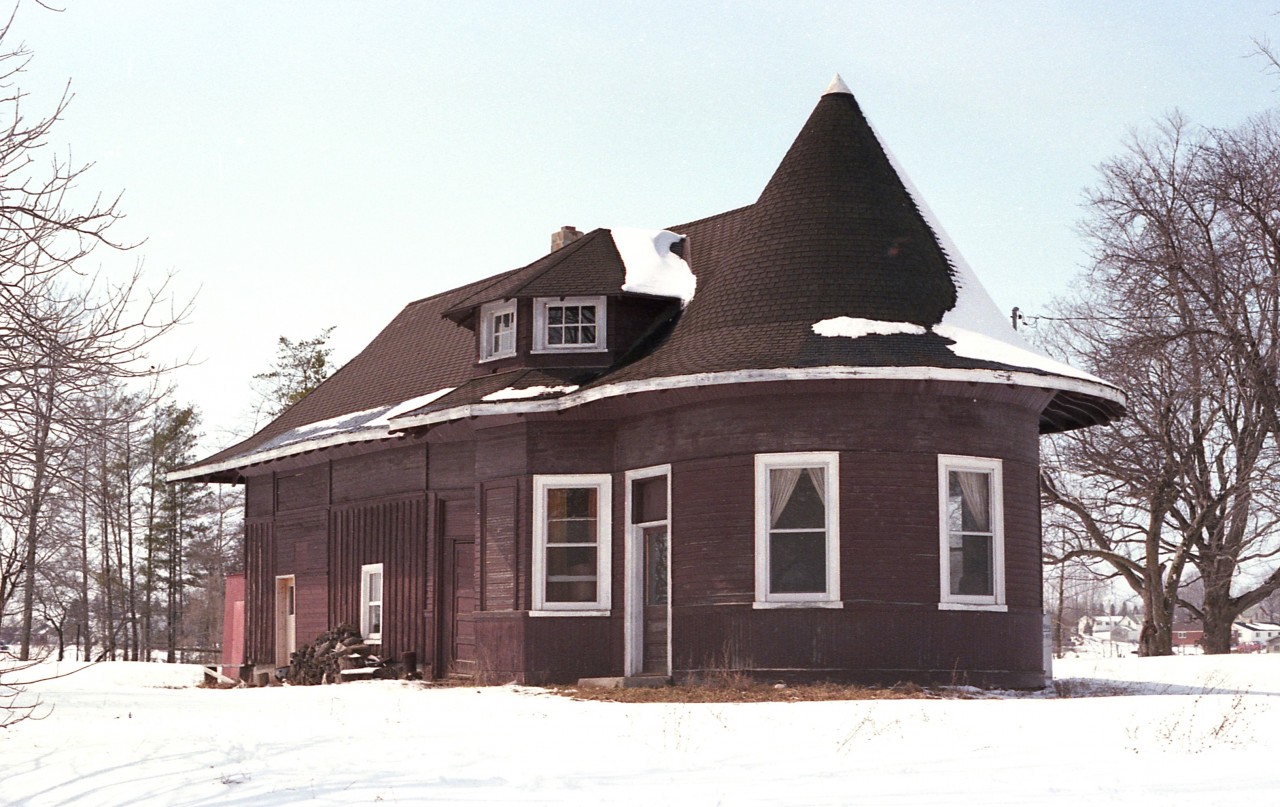 In the village of Blyth there is an old railroad station which seems like it is in the middle of nowhere as far as stations go.  It is. The last train ran on the old London, Huron & Bruce Railroad back in April of 1941. The trains used to operate from London thru Clinton, Blyth to Wingham.  From the day I shot this image, the line had been 40 years gone, and the track and most all reminders that there had actually been a railroad thru here had pretty much vanished.
Citizens of Blyth so loved the little station that they purchased it for nostalgic reasons. It sat empty for many years but now, in 1981, it  has became a residence, and still is to this day.