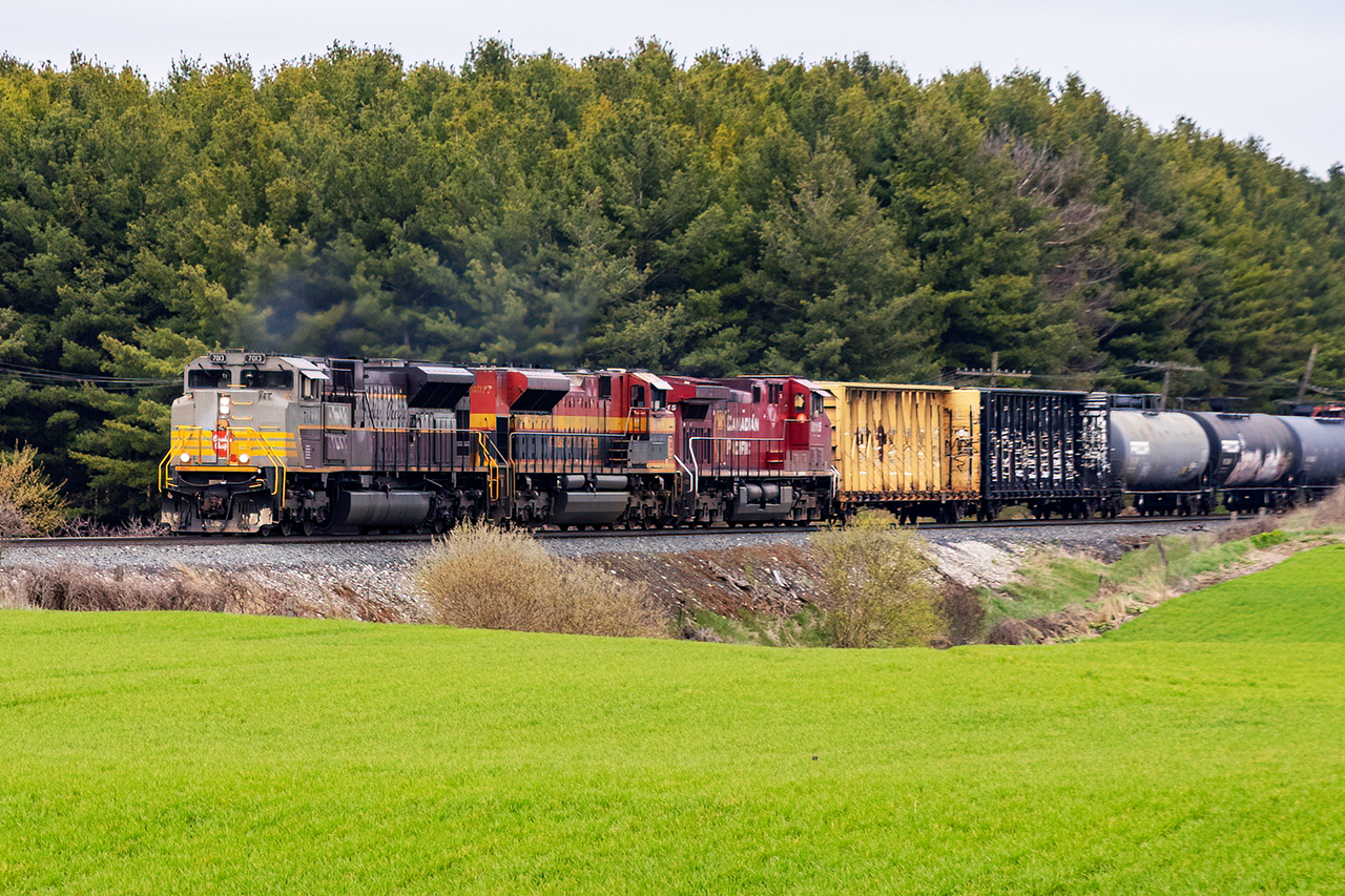 There are only 9 of these units left now, with 7015's future still to be determined (It went dead to Chicago on 137 yesterday. Where it goes from there will speak loudly about its future). Trailed by KCSM 4077 ( a trailing KCS unit becoming ubiquitous on CP these days;' who saw that coming)and 8112, 137 flies through Drumbo with a cut of mixed freight just lifted in Wolverton. CP was just going Action Red when I started paying attention to trains, so I never got to see this scheme in real life on anything, much less the C630s and SD40s where it looked perfect. But I'll take as much of this as I can get; a scheme that harkens back to when railroading was still great, and service mattered just as much as shareholders; something a few CEOs need to contemplate IMHO.