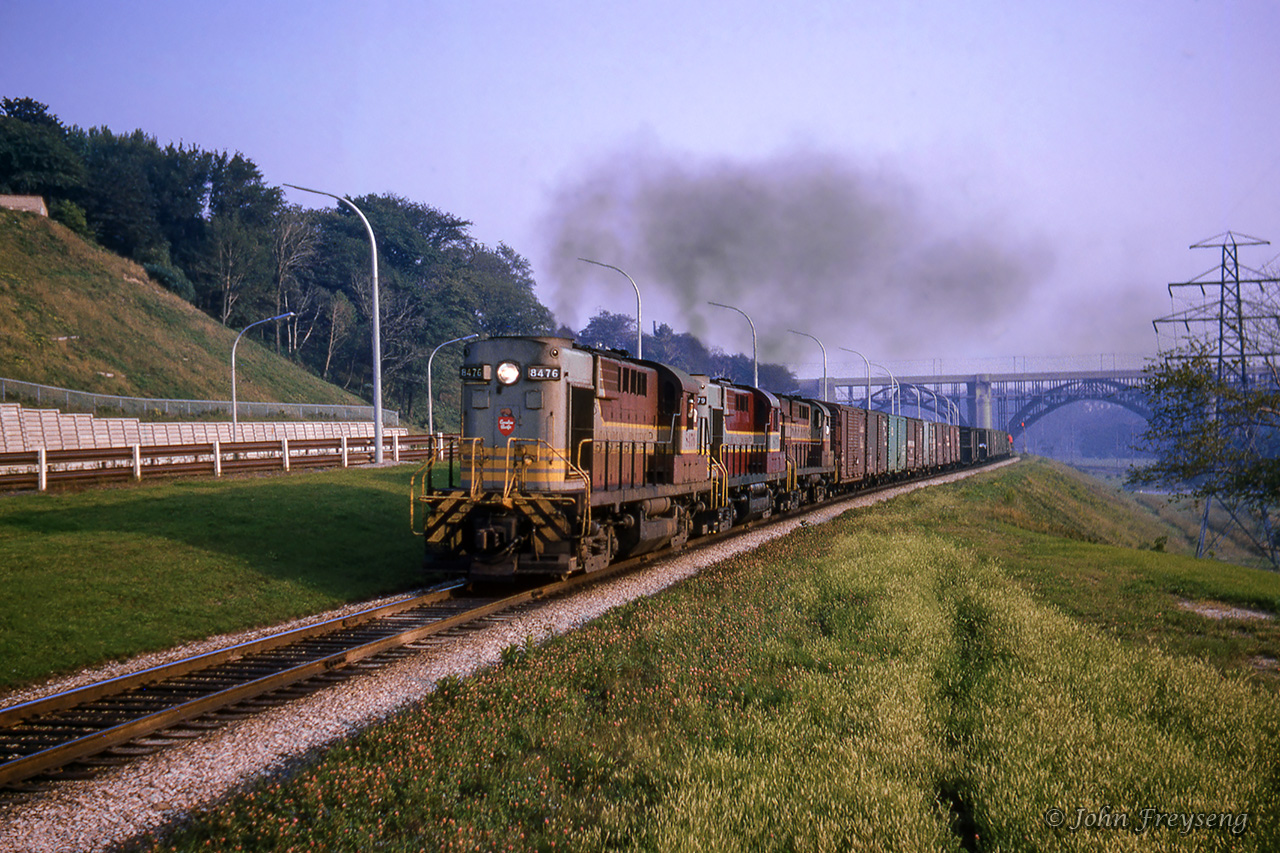 An eastbound timetable freight works from Parkdale Yard work sits way along the Don Branch section of the Belleville Sub, just north of the Bloor viaduct.Scan and editing by Jacob Patterson.