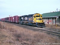 NS 328 with BNSF SD40-2 6869 and NS SD40-2 6123 through St. Catharines on the CN Grimsby Sub back in 2006.