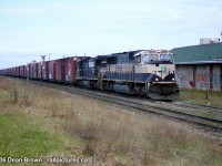 NS 328 with BNSF 9593 and NS 8567 through St. Catharines on the CN Grimsby Sub back in 2007.