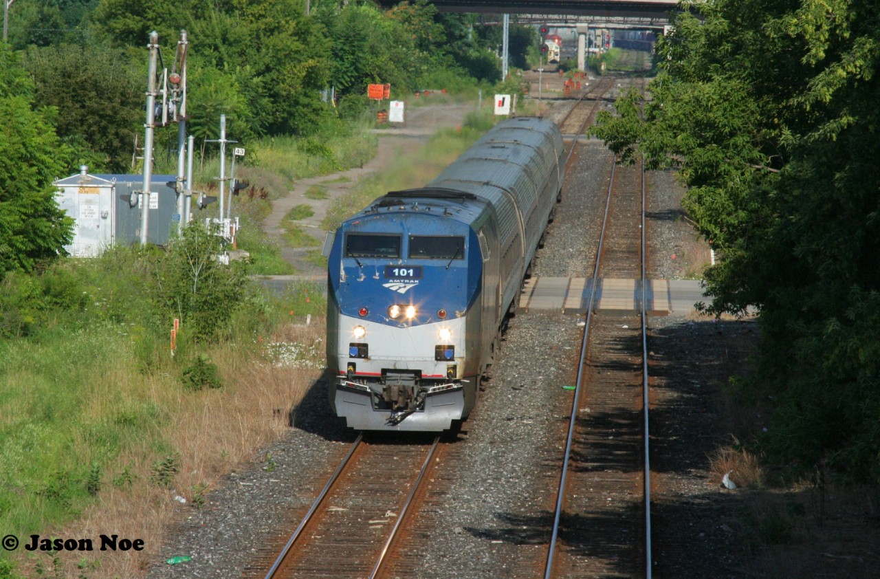 VIA Rail # 97 with Amtrak P42DC 101 is viewed passing Mile 43 on the CN Grimsby Subdivision in Hamilton, Ontario.