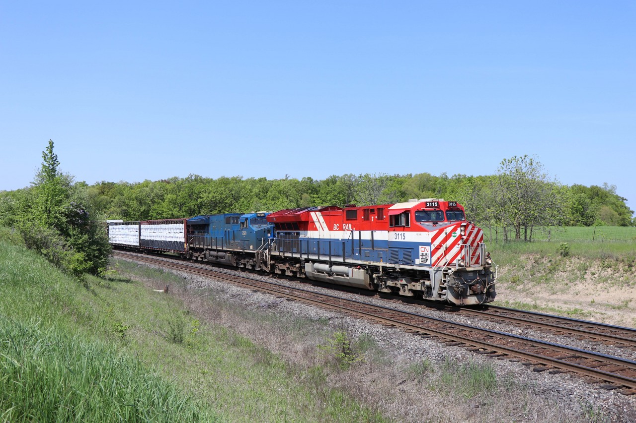 Sunday's "catch of the day"--CN 397 with BC Rail heritage unit 3115 and GECX 2029, one of the last GECX units still in blue, approaching Tremaine Road in north Burlington. For the record, the DPU was CN 2865.