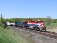 Sunday's "catch of the day"--CN 397 with BC Rail heritage unit 3115 and GECX 2029, one of the last GECX units still in blue, approaching Tremaine Road in north Burlington. For the record, the DPU was CN 2865.