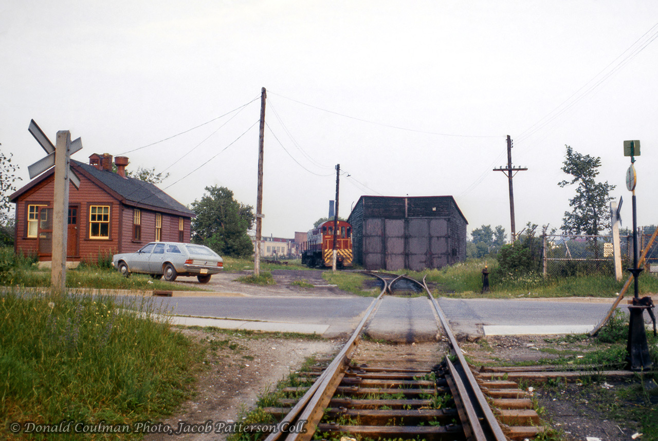 Taking a step across Alice Street from last week's posting, a wider view of the CPR Guelph engine house facilities on the Fibreglass Spur in Guelph.  CPR MLW S11 6617 is assigned as the Guelph yard engine.

As mentioned in previous comments by retired CPR conductor, Ron Bowman, the CPR structure at left was sold for use as a private residence, now located at 28 Sackville Street, just a little way behind the photographer around the wye.



Donald Coulman Photo, Jacob Patterson Collection Slide.