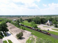 CN's London East, ON to Paris West, ON e/b turn makes a quick stop at Princeton to cut clear of the crossing to service the third customer of the day Stubee's Cement. They will pull four and spot three and then head over to Paris to run around their train and head back to London switching out a fuel transload facility in Woodstock. Several customers in the area take a wide variety of cars, today some CPKC & UP hoppers and scrap metal from Woodstock make up the headend traffic of 23 cars. Today this train has GP9rm 4038 + 7038 & GP38-2 4717 provide the power.May 23, 2024~MP 37.7 Dundas Subdivision (Princeton, ON)~