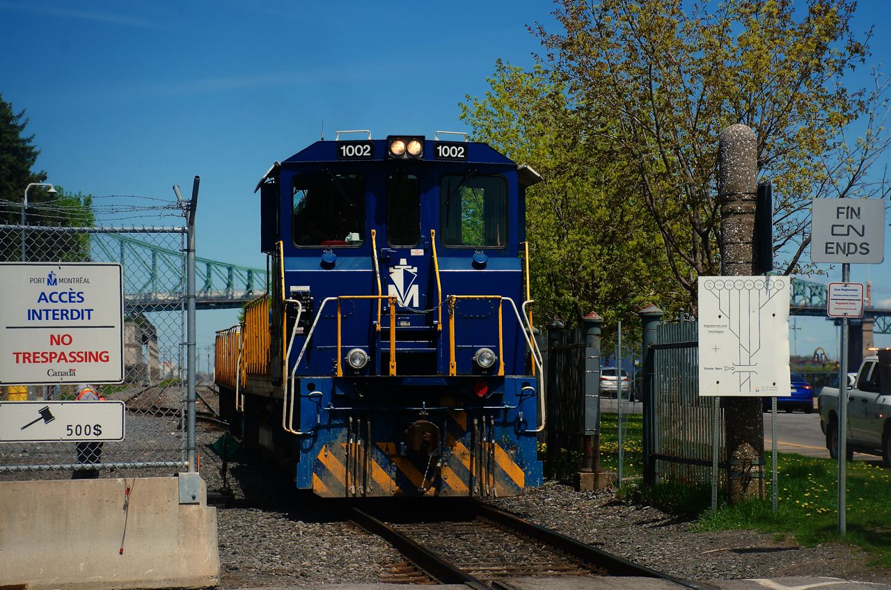 Port of Montreal power is backing up after crossing over at the west end of Port of Montreal trackage.