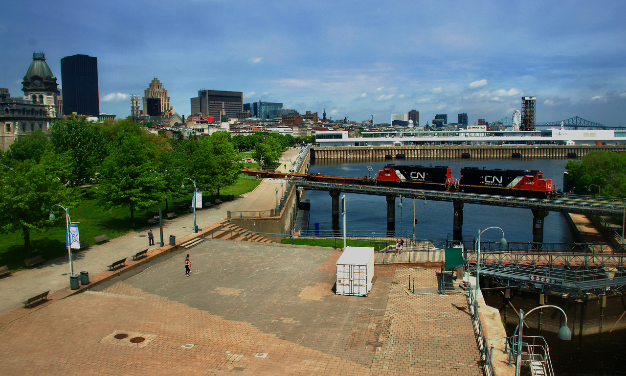 CN 500 is leaving the Port of Montreal with baretables up front and CN 4940 & CN 4935 for power.