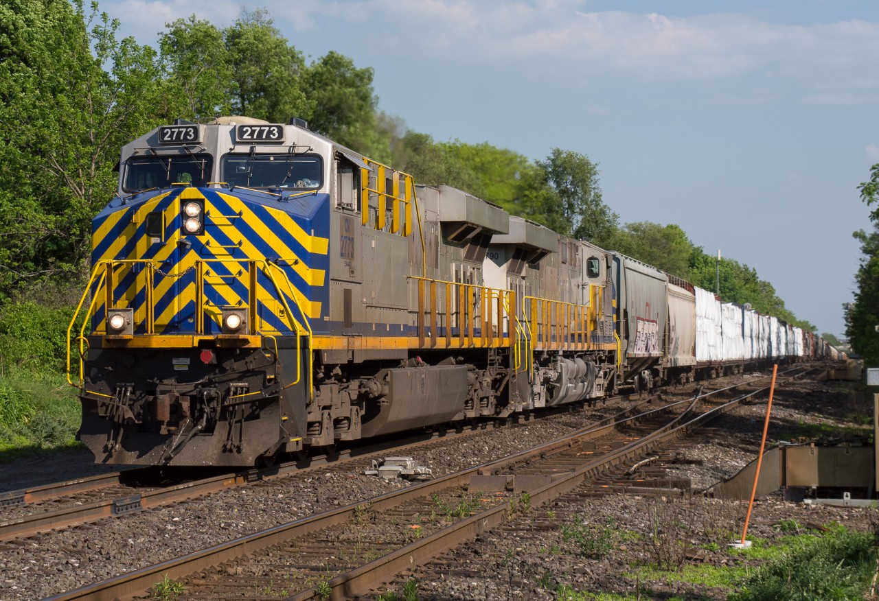 CN 435 blasts out of Brantford at Hardy Road after making a set off at lift.  The power on this day was an ex CREX pair in the form of CN 2773 and CN 2790.