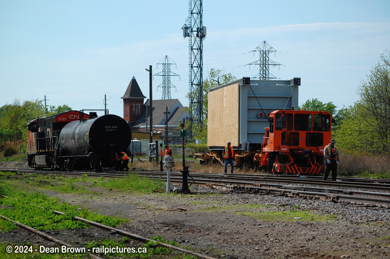 Is CN 562 waiting at Merritton for the track mobile to shove the loaded car to CN on May 13/24