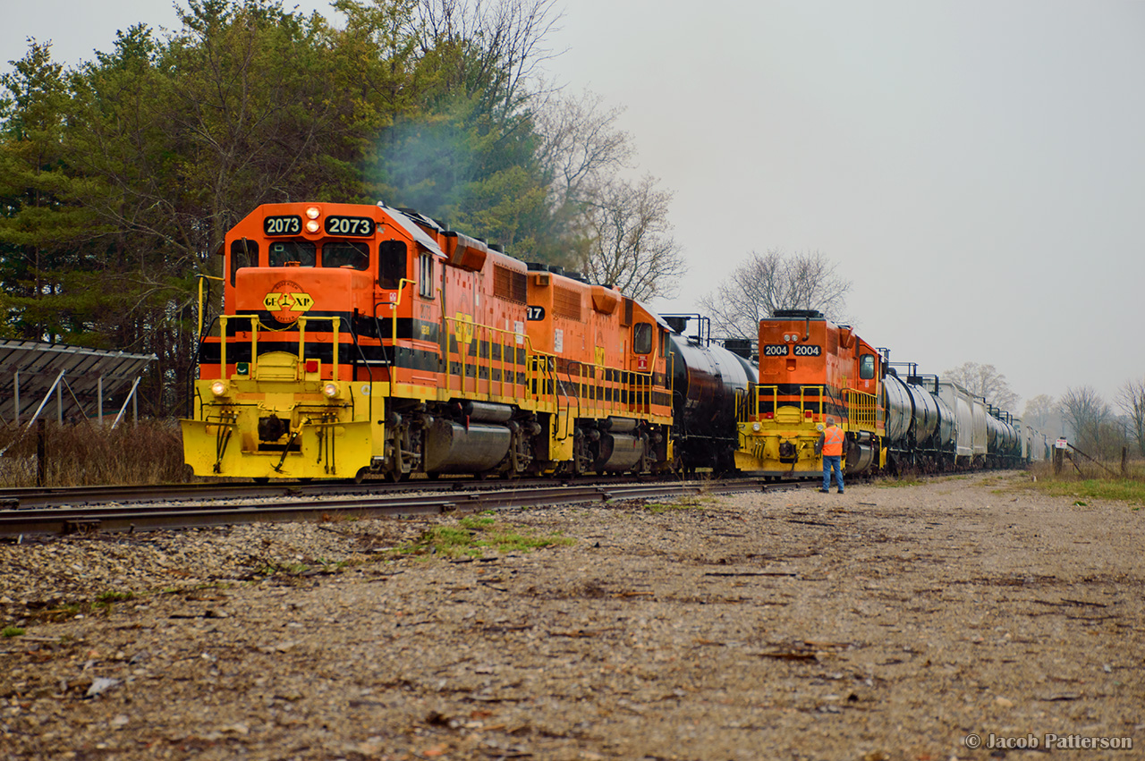 It's Friday afternoon, and GEXR crews on the Guelph Junction Railway are almost finished their work for the weekend.  The crew of 583 has paused their work, setting off cars in the siding at Arkell, to give a roll by inspection to 582.