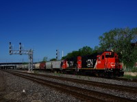 CN 500 is leaving Track 29 with eleven grain cars.