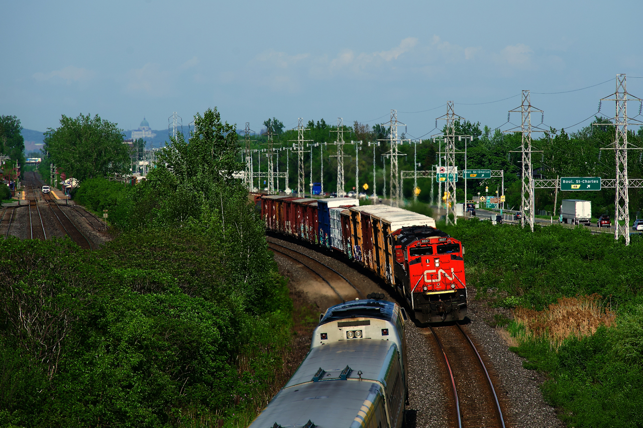 CN 327 and VIA 64 meet at speed in Beaconsfield.