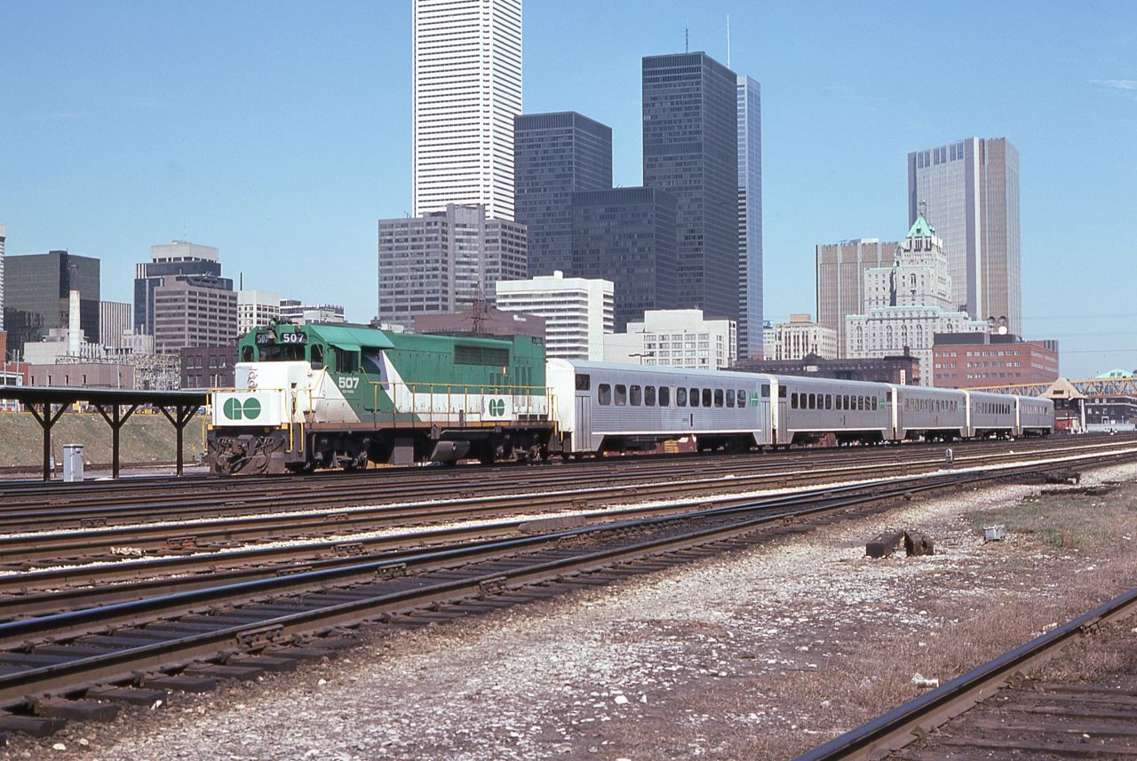 GO 507, the last of the original 8 GP40TC units, leads a 5 car train westbound out of Union Station, Toronto, Ontario on April 16, 1977.  The 507 was sold to Amtrak in 1988 as their 199 and subsequently renumbered to 527.