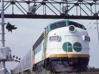 GO Transit APCU 906, rebuilt from ONR 1511, brings up the rear as the train crosses Winston Churchill Blvd on July 16, 1977.