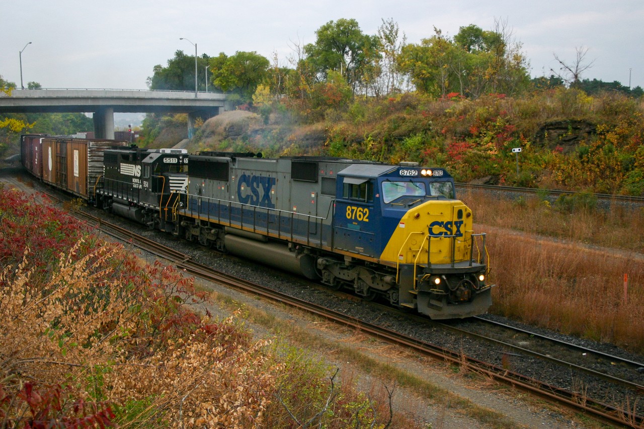 As always, you never know what power would be on NS 327.  On a dreary November morning, a late running NS 327 works up the Cow Path with CSXT 8762 and NS 5511.