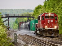 The yearly event. I always look forward to seeing what CP decides to stick on the spray train for power. Definitely lots of variety over the years from SD40’s to SD60’s, CMQ cowls, D&H GP38 and even a rescue UP SD70M last year. This year’s arrival in Toronto would find one SD60 swapped for another SD60, before the train would begin its journey westward toward Windsor. The overcast weather worked well for a morning westbound run, and by mid morning the train was well on its way up the Niagara  Escarpment. Here former SOO Line SD60 6236 has just ducked under the well known wooden farm bridge alongside highway 401  just east of Campbellville. 