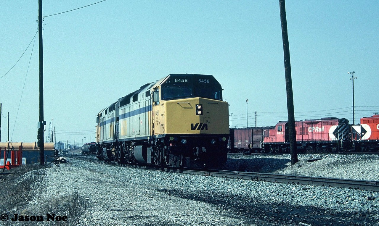 Leased VIA Rail F40PH-2’s 6458 and 6454 have rolled-off the shop tracks at CP’s Toronto yard diesel facility. The pair are heading to the east end of the yard where they are likely heading for a waiting train destined for the Belleville Subdivision or possibly a transfer run. During 1994-1995 CP had leased several VIA Rail units to assist them through their severe motive power shortage until the new GE's that were on order started arriving.