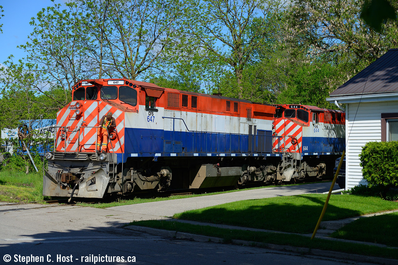 L542 pauses at Crimea St in Guelph waiting to enter the mainline and set off their train of cars and 2 recently sold CFS (former OSR) locomotives off the main. Permission to enter the main was not granted, and as as result, 542 would pull back and set off the locomotives and cars in XV yard instead. CN 7068 had the duties of the work solo on this train.