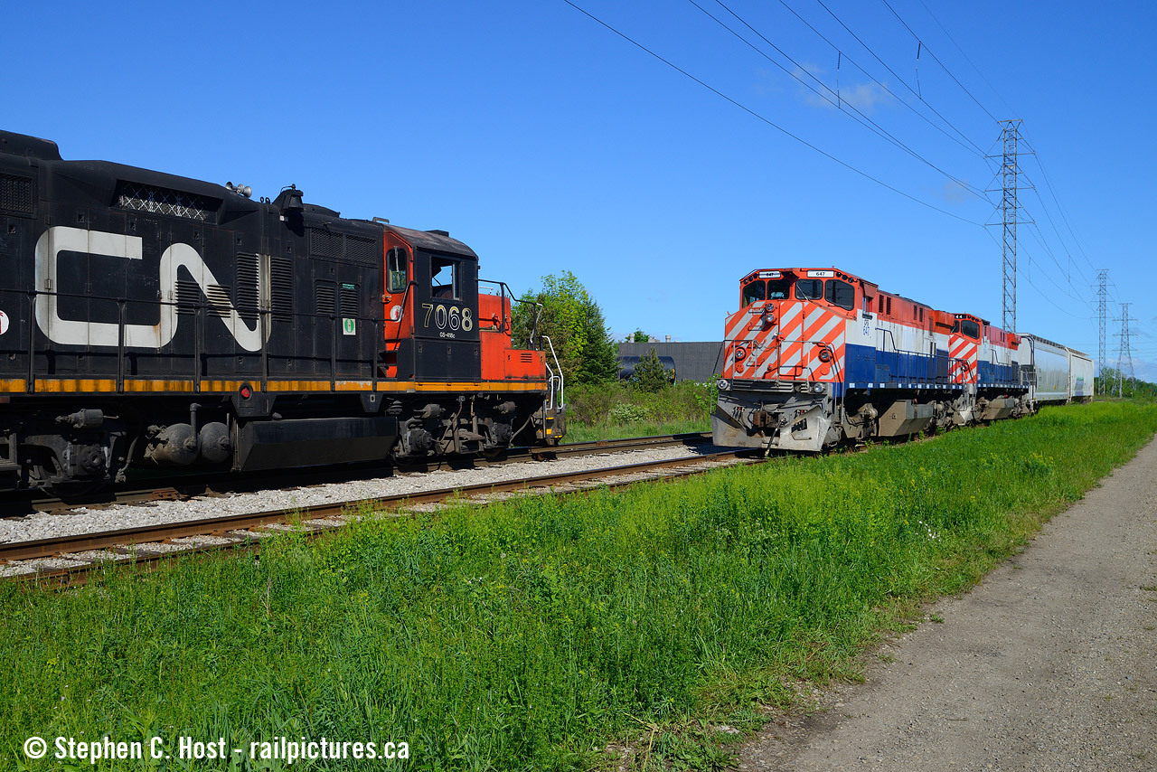 Part 1 of 3: On Sunday May 31 2020 CN ran L542 out of Guelph as they had parked in town for the night, owing to maintenance issues south of town where they would normally park in Galt during this time. What was a rather routine weekend job became less than routine, for after switching Traxxside in great early morning light I would photograph them passing the CFS former OSR M420's at the interchange. Little did I know that they would attach to this cut of cars and the locomotives and begin shoving southward toward the mainline giving me a rare mileage chase on my hands.