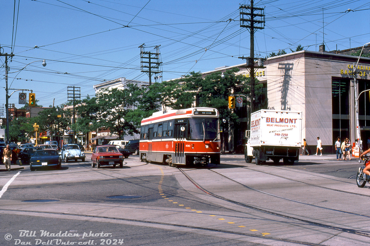 A nice sunny afternoon along College Street finds TTC CLRV 4080 operating on the 506 College streetcar route, heading east in traffic on College at Spadina Avenue as people go about their day. At the time, the CLRV's were still in their infancy, and still retained their front and rear couplers (but they never ran MU'ed in revenue service).

William (Bill) Madden photo, Dan Dell'Unto collection slide.