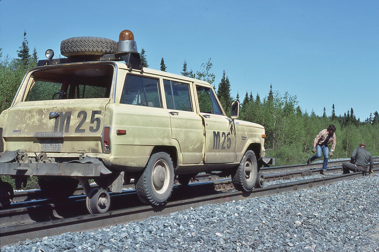 Working on the iron ore road with a Jeep Cherokee hi railer.


Cartier Railway near mile 10 South Sub-Division, June 8, 1981 Kodachrome by S.Danko.