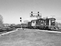 <br>
<br>
  GMD 1956 built SW1200RS #1207 - 1213 power on what appears to be a regular scheduled (no flags) transfer to CN Hamilton.
<br>
<br>
  At Bayview Jct., March 19, 1978 Kodak Tri X negative by S.Danko 
<br>
<br>
For a while it seemed that the action at Bayview was non-stop, more:
<br>
<br>
     <a href="http://www.railpictures.ca/?attachment_id=  44475 "> passenger geep   </a>
<br>
<br>
sdfourty

