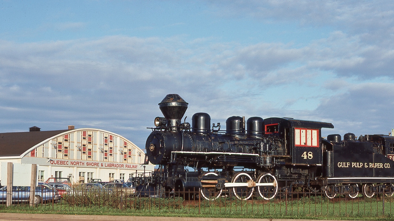 The QNSL steamers.


  ex Gulf Pulp & Paper #48 (0-6-0 Davenport Iowa built March 1931) on display and in front of ex QNSL #702 ( 4-6-2, ex TEM #159)


At the QNSL headquarters, Sept-Iles PQ, June 7, 1981 Kodachrome by S.Danko.


Since this Kodachrome was exposed, the #702 was freshened up, the fence removed and #48 was moved to Clarke City west of Sept-Iles.