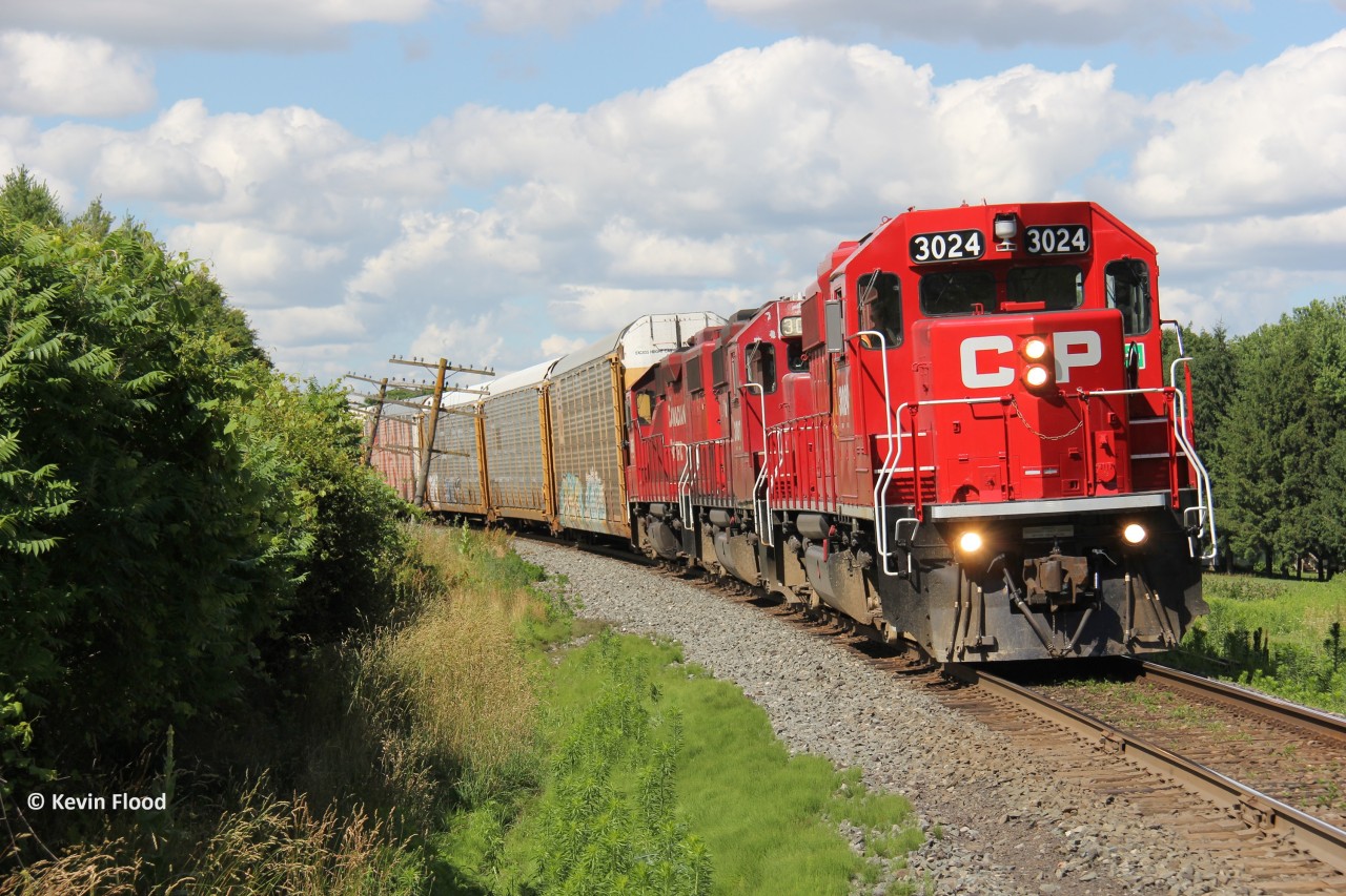 Following closely behind CPKC 137 (but not close enough as I really had to leave!), what appears to be the Hagey Job (no idea of symbol these days), heads into Wolverton at Reidsville (just east of Ayr, ON) with a trio of GP38-2s: recently repainted 3024, followed by 3087 and 3055. Thankfully not a single Eco locomotive, as I don't find them photogenic. CPKC 238 was rotting at Wolverton for hours having engine issues with the their leader, KCSM 4558. After this train got into Wolverton, they ran light to Galt to wye their power so that 8174 could lead. I am not sure if the train actually left Wolverton this day as I saw a picture of 238 with 8174E from the following day. No idea! It's just typical CPKC shenanigans.