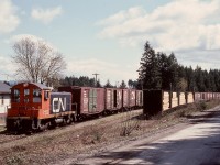 On Vancouver Island, after several years with G12 units CN 991 and 992, CN tried SW8 units at Deerholme for the runs to Youbou and down to the barge slip at Cowichan Bay.  First up was CN 7152, seen here on Tuesday 1976-04-20 idling near the bunkhouse at Deerholme with a string of empties preparing for departure to Youbou.

<p>Various single SW8s lasted at Deerholme until replaced by A-1-A-trucked GMD-1s later in 1976, and the 1000s continued until the end of service there on 1988-03-30.