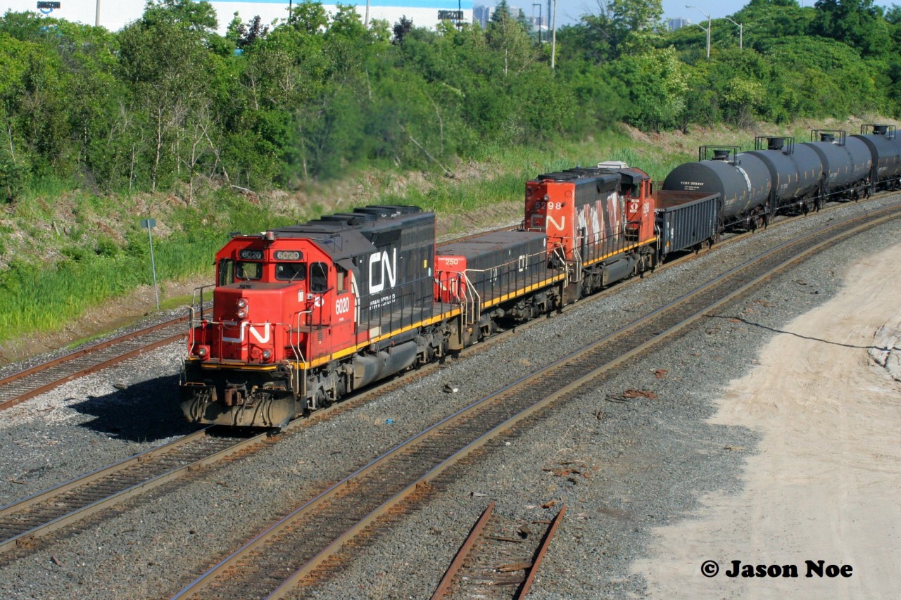 It’s been more than three decades since I photographed CN 7500 working the hump at MacMillan Yard in Vaughan, Ontario. Now in 2024, those assignments are held by SD40u’s and SD40-2(W)’s, which would have been busy operating on priority mainline trains back in 1994. Man, how the times have changed during a pleasant June evening as SD40u 6020, GP9 Slug 250 and SD40-2(W) 5298 are viewed approaching Rutherford Road with another cut of cars to be sorted over the hump at MacMillan Yard.