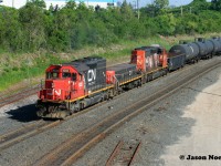 It’s been more than three decades since I photographed CN 7500 working the hump at MacMillan Yard in Vaughan, Ontario. Now in 2024, those assignments are held by SD40u’s and SD40-2(W)’s, which would have been busy operating on priority mainline trains back in 1994. Man, how the times have changed during a pleasant June evening as SD40u 6020, GP9 Slug 250 and SD40-2(W) 5298 are viewed approaching Rutherford Road with another cut of cars to be sorted over the hump at MacMillan Yard.