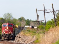 With under 2 hours to go until Smiths Falls and a crew change, CP 8167 rounds the curve at Lonsdale leaving the farmland behind and entering the more rugged landscape of eastern Ontario.