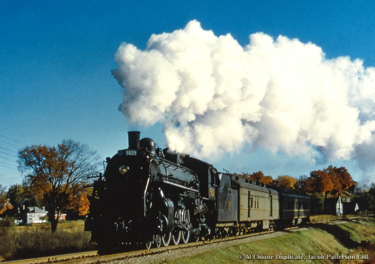 Train 169, running Palmerston - Stratford, approaches King Street at the edge of Palmerston.  An old CN 'no trespassing' sign still remains at this location today next to the abandoned right of way.


Original Photographer Unknown, Al Chione Duplicate, Jacob Patterson Collection Slide.