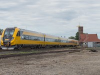 On June 25th, the latest Via Rail Siemens Trainset travelled through Southern Ontario on its way to MMC to be handed off by CN to Via.  This set is a one of scheme reminiscent of the Turbo Trains of the past.  It is seen here passing through Brantford on CN P276.