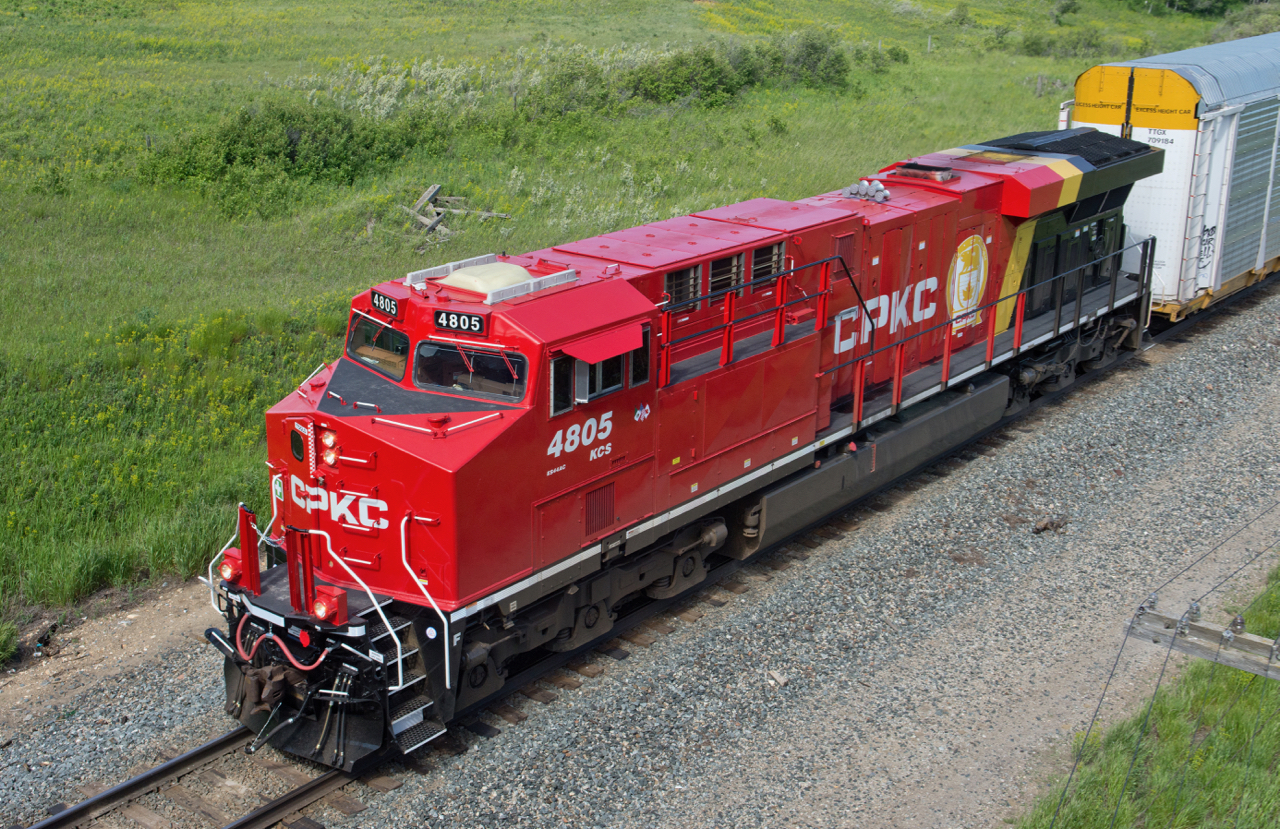 The first KCS unit to be repainted in CPKC colours, KCS 4805 is seen about to duck beneath a sided bridge just east of Mortlach SK.  My thoughts on this new scheme (although completely irrelevant) would be to ditch the gold logo with the white background and just make the letters bigger.  What are your thoughts ?