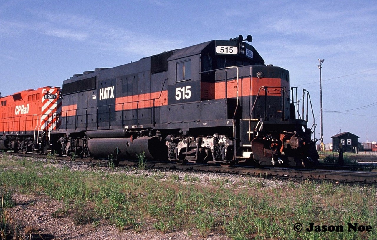 HATX GP40-2 515 is seen with CP GP9u 8247 at CP’s Toronto Yard preparing to head to the diesel shop. At the time, CP had a large group of Helm Financial Corporation units leased as part of their rapidly expanding mid-90’s lease fleet. GP40-2 515, was former Boston & Maine 311, which later went on to become Ontario Northland Railway 2200 in 2005.