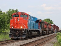CN 8952 in GTW heritage paint scheme leads M397 down the Halton Sub. on what is another hot humid day. Trailing units are CN 2233 CN 3216.
